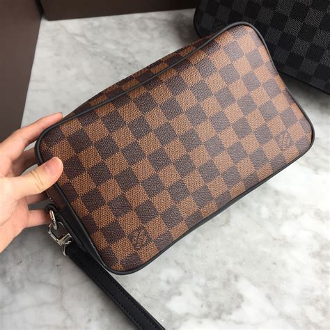 lv man clutch|louis vuitton pouch men's.